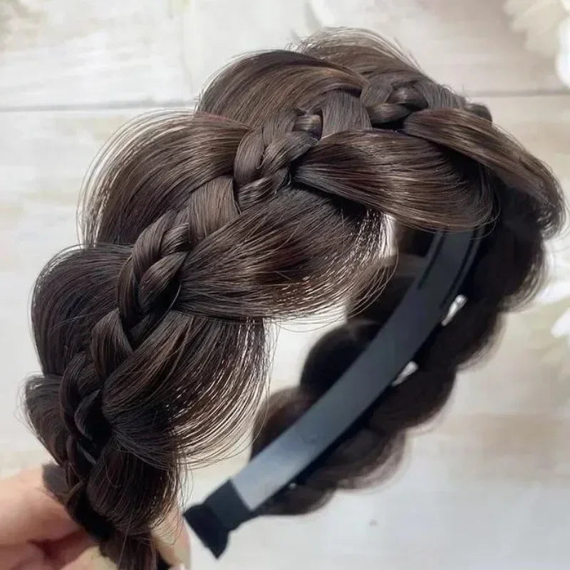 Effortlessly chic and handmade, this 1pc Twist Headband features wide fishbone braids and ribbon detailing. Perfect for stylish hairdos, it’s a versatile accessory for everyday or special occasions!